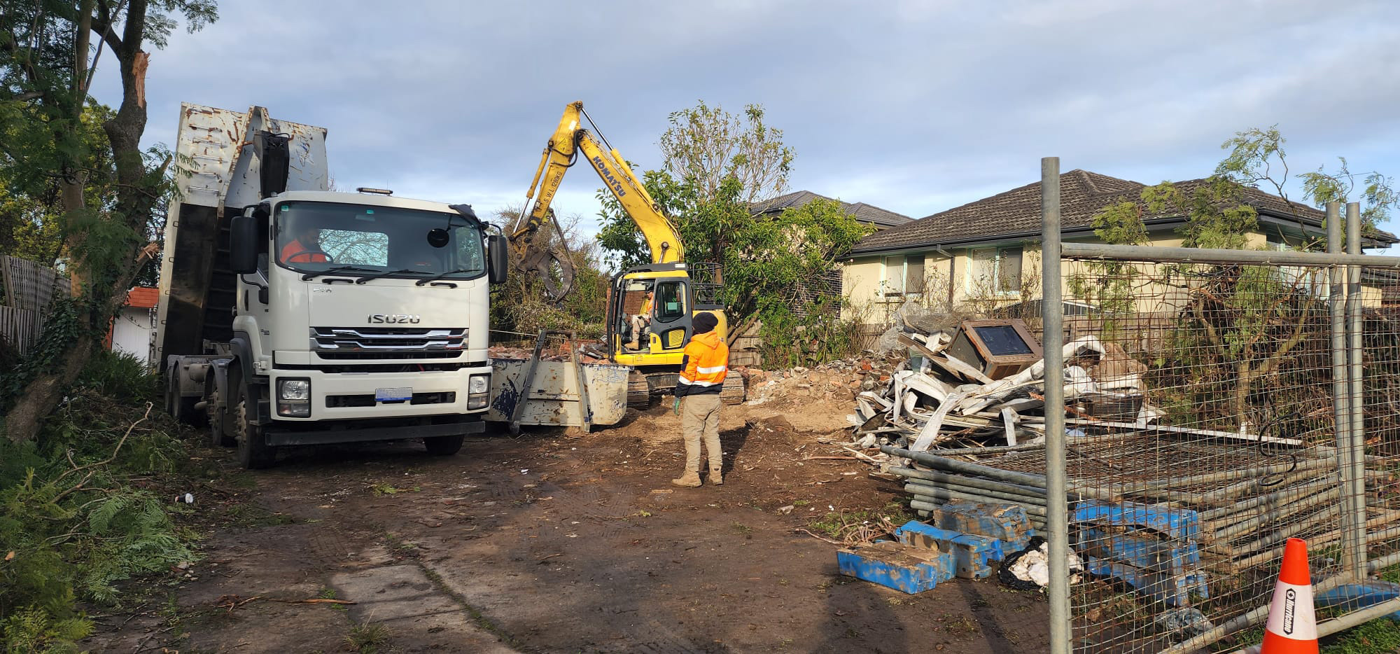 Excavator and tipper truck on an Exccell Demolition site