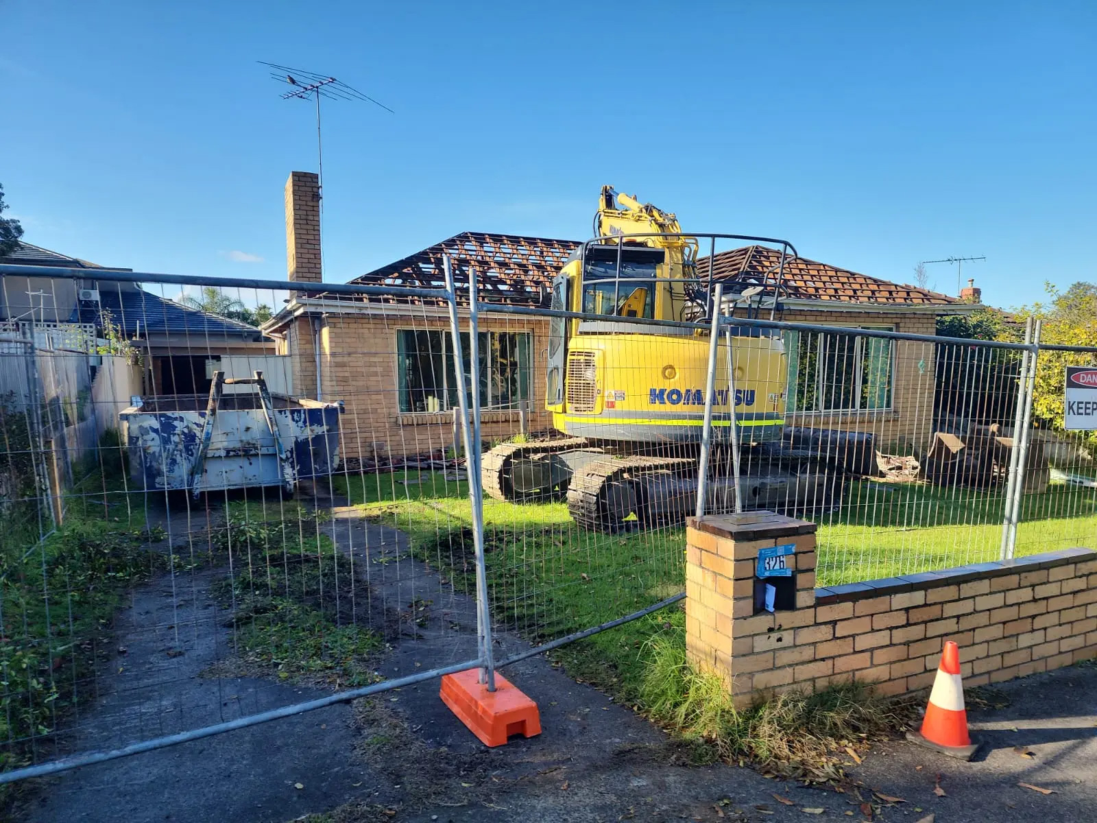 Demolition work and machinery on site